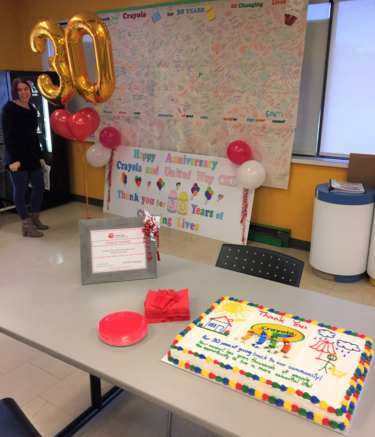 2018 thank you sign, cake, certificate and balloons.