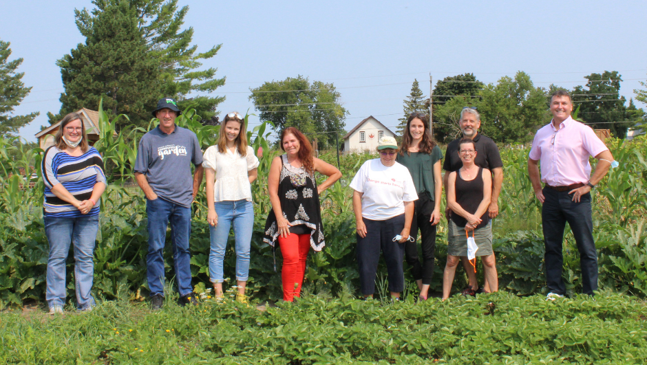 Crayola Canada and UWCKL Staff touring Edwin Binney's Community Garden in 2021.